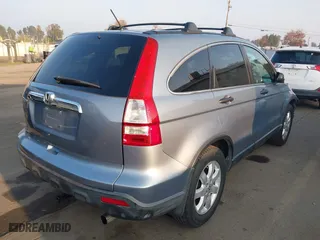 2008 Honda CR-V EX with VIN 3CZRE38568G706370, listed as a IAAI auction lot 41031674 with 124,494 mi miles. Bid and sale history available at carsss.com. Image 4.
