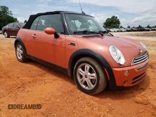 2006 MINI Convertible with VIN WMWRF335X6TF64910, listed as a Copart auction lot 60222215 with 85,761 mi miles and Salvage title. Bid and sale history available at DreamBid. Image 4.