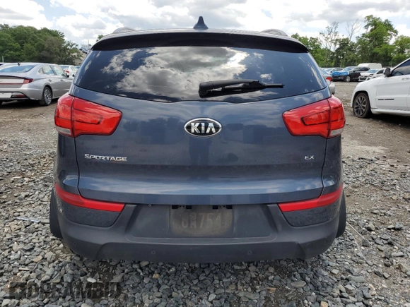 2014 Kia Sportage EX with VIN KNDPCCAC2E7629547, listed as a Copart auction lot 61255755 with 86,324 mi miles and Salvage title. Bid and sale history available at DreamBid. Image 6.