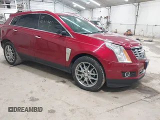 2014 Cadillac SRX Performance Collection z VIN 3GYFNCE30ES596415, wystawiony jako IAAI lot #42329771 z przebiegiem 71 620 mil mil oraz . Historia ofert i sprzedaży dostępna na DreamBid. Obrazek 1.