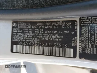2003 BMW 3 Series 325i with VIN WBAAZ334X3PH33503, listed as a Copart auction lot 65090995 with 198,603 mi miles and Clean title. Bid and sale history available at DreamBid. Image 12.