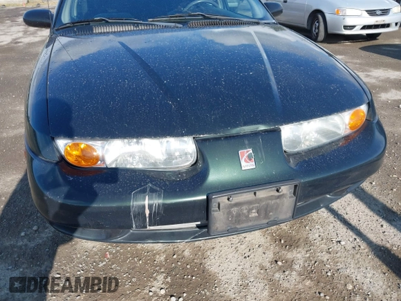 2000 Saturn SL z VIN 1G8ZK5271YZ165467, wystawiony jako IAAI lot #42367156 z przebiegiem 185 962 mil mil oraz . Historia ofert i sprzedaży dostępna na DreamBid. Obrazek 15.