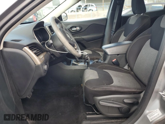 2015 Jeep Cherokee Sport z VIN 1C4PJLAB1FW711631, wystawiony jako Copart lot #58373145 z przebiegiem 123 683 mil mil oraz Szkoda całkowita • Salvage title. Historia ofert i sprzedaży dostępna na DreamBid. Obrazek 7.