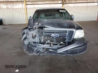 2005 Ford F-150 STX with VIN 1FTRX12W25NA37703, listed as a Copart auction lot 60089325 with 128,651 mi miles and Salvage title. Bid and sale history available at DreamBid. Image 5.
