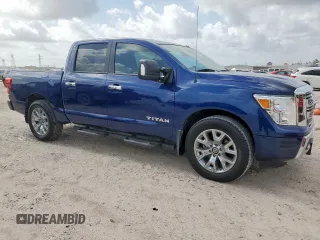 2021 Nissan Titan SV with VIN 1N6AA1EF0MN512559, listed as a Copart auction lot 61561305 with 31,344 mi miles and Salvage title. Bid and sale history available at DreamBid. Image 4.