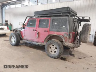 2011 Jeep Wrangler Unlimited Sport with VIN 1J4HA3H1XBL534312, listed as a IAAI auction lot 41030703 with 1 mi miles. Bid and sale history available at carsss.com. Image 3.