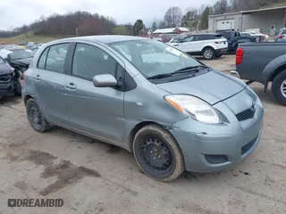 2009 Toyota Yaris with VIN JTDKT903695257498, listed as a IAAI auction lot 41832557 with 137,995 mi miles. Bid and sale history available at carsss.com. Image 1.