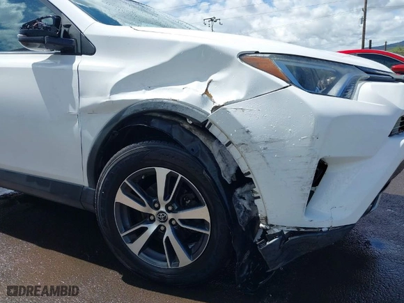 2018 Toyota RAV4 XLE with VIN 2T3WFREV1JW472786, listed as a IAAI auction lot 39980689 with 63,535 mi miles. Bid and sale history available at carsss.com. Image 6.
