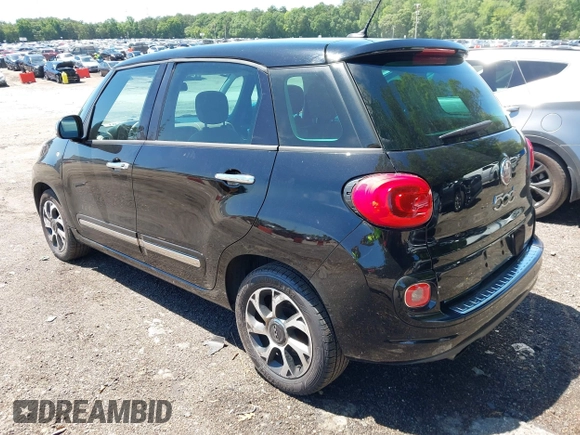 2014 FIAT 500L Lounge with VIN ZFBCFACH3EZ009820, listed as a IAAI auction lot 42294242 with 84,557 mi miles and . Bid and sale history available at DreamBid. Image 3.