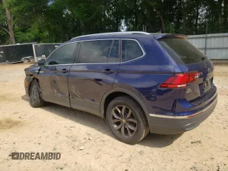 2023 Volkswagen Tiguan SE with VIN 3VV3B7AX9PM102224, listed as a Copart auction lot 57221585 with 21,202 mi miles and Salvage title. Bid and sale history available at DreamBid. Image 2.