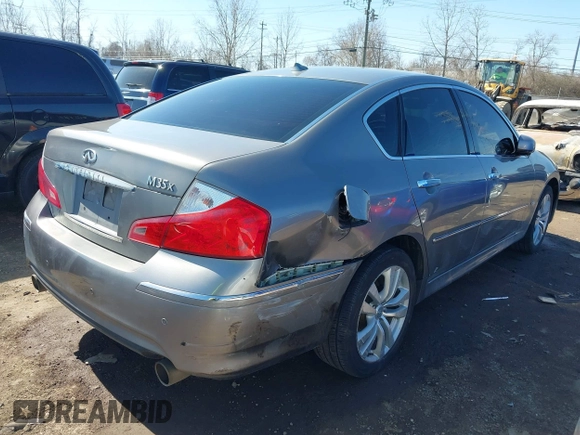 2010 Infiniti M with VIN JN1CY0AR7AM960352, listed as a IAAI auction lot 41754408 with 227,408 mi miles. Bid and sale history available at carsss.com. Image 4.