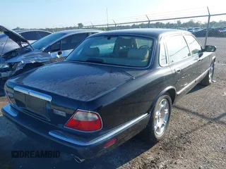 2001 Jaguar XJ Vanden Plas with VIN SAJDA24C81LF23026, listed as a IAAI auction lot 42671098 with 83,759 mi miles and . Bid and sale history available at DreamBid. Image 4.