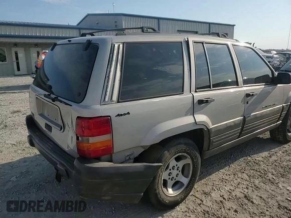 1998 Jeep Grand Cherokee Laredo with VIN 1J4GZ58S8WC301754, listed as a Copart auction lot 69698144 with 205,739 mi miles and Non Repairable. Bid and sale history available at carsss.com. Image 11.