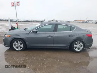 2014 Acura ILX Hybrid Technology z VIN 19VDE3F75EE300312, wystawiony jako IAAI lot #41608572 z przebiegiem 126 974 mil mil oraz . Historia ofert i sprzedaży dostępna na DreamBid. Obrazek 14.