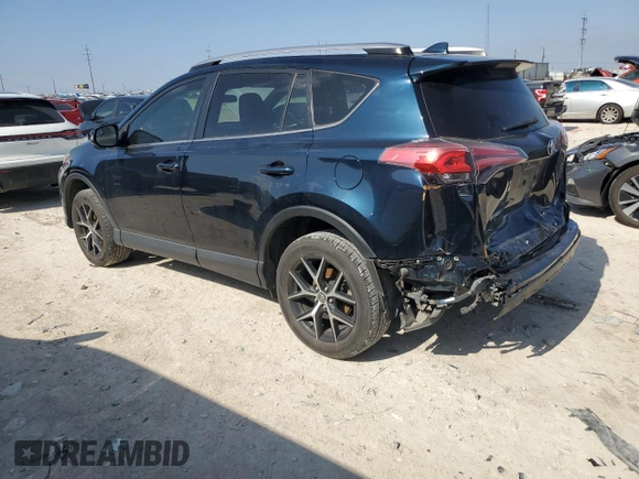 2017 Toyota RAV4 SE with VIN JTMNFREV7HJ142221, listed as a Copart auction lot 86334074 with 123,165 mi miles and Salvage title. Bid and sale history available at DreamBid. Image 2.