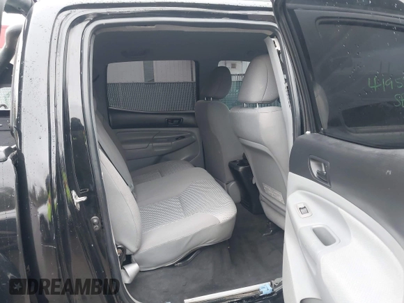 2015 Toyota Tacoma with VIN 3TMLU4ENXFM185371, listed as a IAAI auction lot 41952513 with 87,128 mi miles and . Bid and sale history available at DreamBid. Image 8.