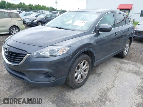 2014 Mazda CX-9 Touring z VIN JM3TB2CAXE0445450, wystawiony jako IAAI lot #42477260 z przebiegiem 139 583 mil mil oraz . Historia ofert i sprzedaży dostępna na DreamBid. Obrazek 2.