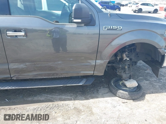 2018 Ford F-150 XL with VIN 1FTEW1CP2JFB50015, listed as a IAAI auction lot 41938177 with 248,137 mi miles and . Bid and sale history available at DreamBid. Image 6.