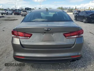 2017 Kia Optima LX z VIN 5XXGT4L37HG142309, wystawiony jako Copart lot #61533985 z przebiegiem 66 970 mil mil oraz Nie do naprawy • Non repairable. Historia ofert i sprzedaży dostępna na DreamBid. Obrazek 6.