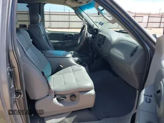 2002 Ford F-150 XL with VIN 1FTRX07L92KC81256, listed as a IAAI auction lot 41765831 with 149,506 mi miles. Bid and sale history available at carsss.com. Image 5.