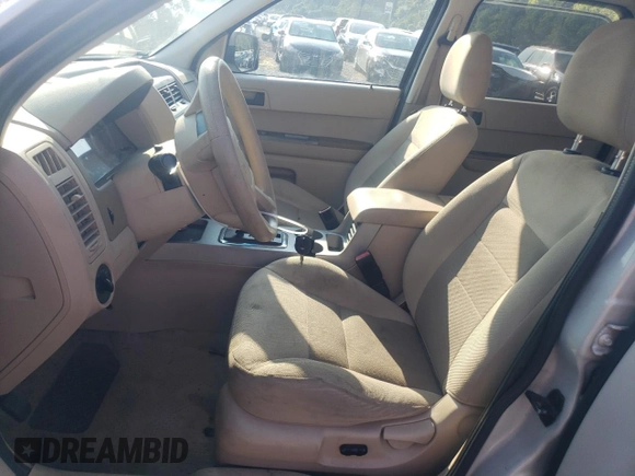 2008 Ford Escape XLT with VIN 1FMCU03178KD39680, listed as a Copart auction lot 62017805 with 149,799 mi miles and Salvage title. Bid and sale history available at DreamBid. Image 7.