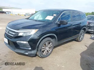 2016 Honda Pilot EX-L with VIN 5FNYF6H5XGB031594, listed as a IAAI auction lot 40409867 with 132,227 mi miles. Bid and sale history available at carsss.com. Image 2.