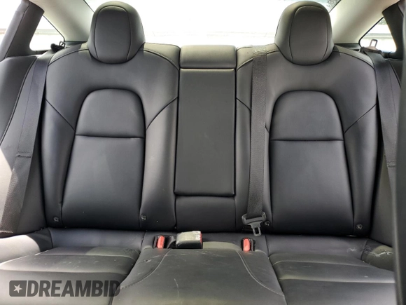 2021 Tesla Model 3 Standard Range Plus with VIN 5YJ3E1EA2MF854713, listed as a Copart auction lot 53783535 with 84,585 mi miles and Non Repairable. Bid and sale history available at DreamBid. Image 10.