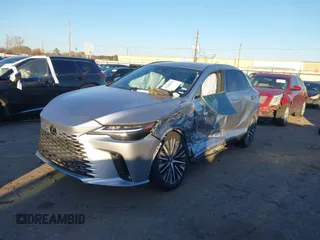 2023 Lexus RX with VIN JTJCHMAA1P2000203, listed as a IAAI auction lot 41409470 with 1 mi miles. Bid and sale history available at carsss.com. Image 16.