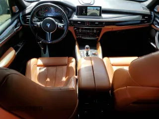 2017 BMW X5 M z VIN 5YMKT6C38H0X20710, wystawiony jako Copart lot #56927285 z przebiegiem 81 524 mil mil oraz Szkody całkowita. Historia ofert i sprzedaży dostępna na DreamBid. Obrazek 8.