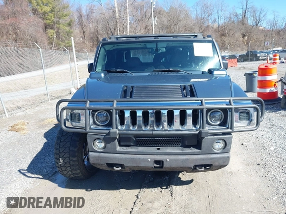 2005 Hummer H2 SUT with VIN 5GRGN22U85H107090, listed as a IAAI auction lot 41514241 with 202,119 mi miles. Bid and sale history available at carsss.com. Image 13.