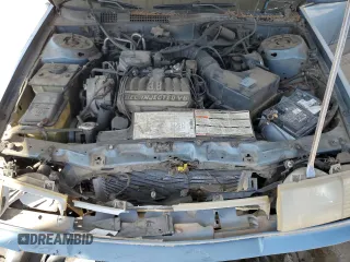 1990 Mercury Sable z VIN 1MECM5348LG630484, wystawiony jako Copart lot #45757565 z przebiegiem 98 764 mil mil oraz Szkody całkowita. Historia ofert i sprzedaży dostępna na DreamBid. Obrazek 11.