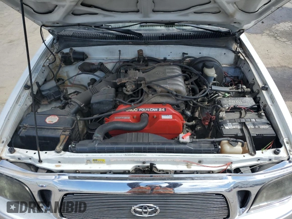 2002 Toyota Tacoma PreRunner with VIN 5TEGN92N02Z887650, listed as a Copart auction lot 49416255 with 290,615 mi miles and Salvage Title. Bid and sale history available at DreamBid. Image 11.