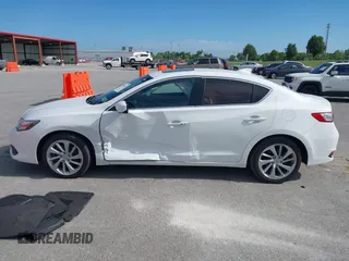 2016 Acura ILX Premium with VIN 19UDE2F77GA000859, listed as a IAAI auction lot 39630610 with 91,576 mi miles and . Bid and sale history available at DreamBid. Image 14.