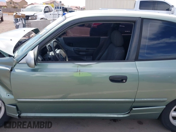 2003 Hyundai Accent GL with VIN KMHCG35C53U277734, listed as a IAAI auction lot 42085996 with 108,369 mi miles. Bid and sale history available at carsss.com. Image 14.