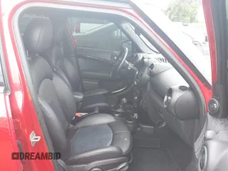 2015 MINI Countryman S with VIN WMWZC3C57FWT04338, listed as a IAAI auction lot 42524134 with 52,137 mi miles and . Bid and sale history available at DreamBid. Image 5.