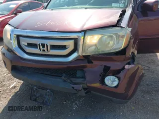 2011 Honda Pilot EX-L with VIN 5FNYF4H58BB060797, listed as a IAAI auction lot 42027084 with 175,466 mi miles. Bid and sale history available at carsss.com. Image 6.