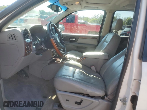 2007 GMC Envoy Denali with VIN 1GKES63M172227637, listed as a Copart auction lot 49858135 with 198,736 mi miles and Salvage Title. Bid and sale history available at carsss.com. Image 7.