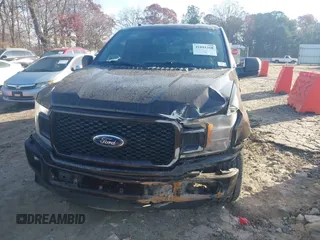 2018 Ford F-150 XL with VIN 1FTEW1C50JFA26307, listed as a IAAI auction lot 41091268 with 129,012 mi miles and . Bid and sale history available at DreamBid. Image 12.