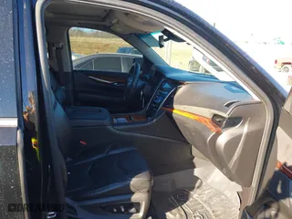 2015 Cadillac Escalade Premium with VIN 1GYS4CKJ0FR180180, listed as a IAAI auction lot 41054933 with 146,974 mi miles. Bid and sale history available at carsss.com. Image 5.