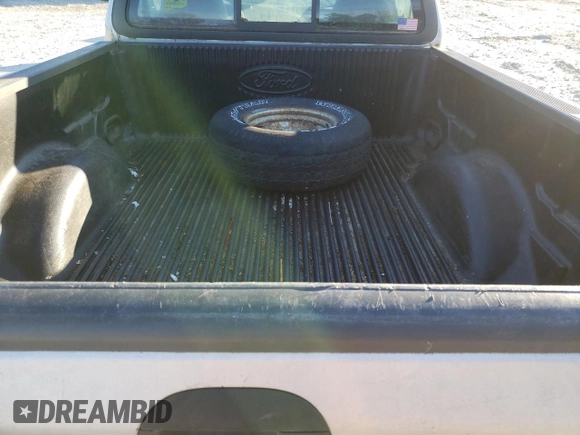 2002 Ford F-150 XL z VIN 1FTRF18212NA49764, wystawiony jako Copart lot #81626174 z przebiegiem Nie podano mil oraz Czysty tytuł • Clean title. Historia ofert i sprzedaży dostępna na DreamBid. Obrazek 10.