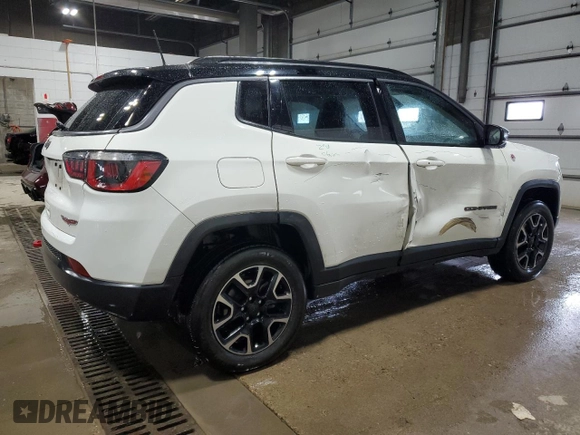 2019 Jeep Compass Trailhawk with VIN 3C4NJDDB5KT703542, listed as a Copart auction lot 54506705 with 86,178 mi miles and Salvage Title. Bid and sale history available at DreamBid. Image 3.
