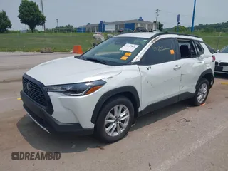 2023 Toyota Corolla Cross LE with VIN 7MUCAABG5PV070262, listed as a IAAI auction lot 42347876 with 24,449 mi miles and . Bid and sale history available at DreamBid. Image 2.