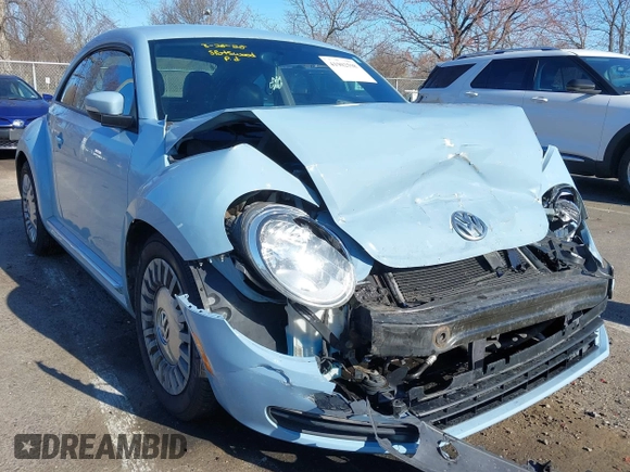 2014 Volkswagen Beetle 2.5L w/Sun with VIN 3VWJP7AT6EM601318, listed as a IAAI auction lot 41902598 with 169,220 mi miles and . Bid and sale history available at DreamBid. Image 1.