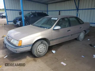1991 Ford Taurus with VIN 1FACP52U4MG122711, listed as a Copart auction lot 61833245 with 73,667 mi miles and Clean title. Bid and sale history available at DreamBid. Image 1.