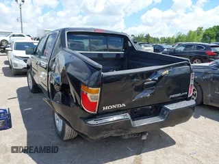 2006 Honda Ridgeline RTL z VIN 2HJYK16596H573159, wystawiony jako IAAI lot #42210214 z przebiegiem 318 126 mil mil oraz . Historia ofert i sprzedaży dostępna na DreamBid. Obrazek 6.