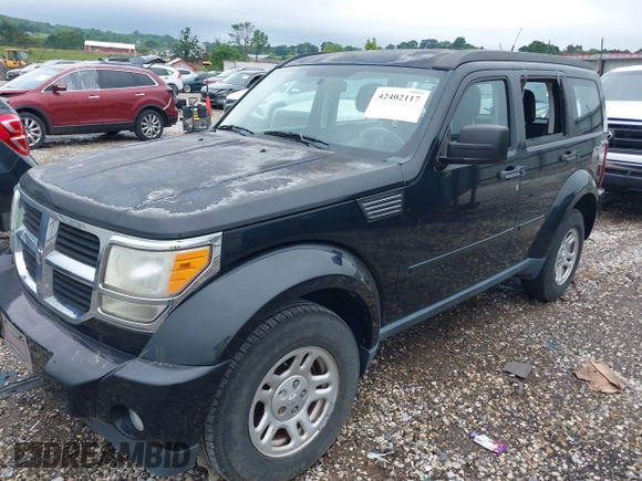 2011 Dodge Nitro SE z VIN 1D4PU2GK2BW506972, wystawiony jako IAAI lot #42402117 z przebiegiem 154 487 mil mil oraz . Historia ofert i sprzedaży dostępna na DreamBid. Obrazek 2.