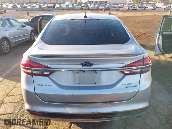 2017 Ford Fusion Hybrid Titanium with VIN 3FA6P0RU8HR190482, listed as a IAAI auction lot 41322244 with 137,539 mi miles and . Bid and sale history available at DreamBid. Image 16.