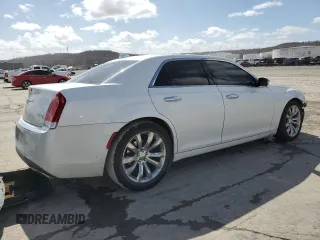 2015 Chrysler 300 C with VIN 2C3CCAET3FH739529, listed as a Copart auction lot 47520495 with 151,096 mi miles and Salvage Title. Bid and sale history available at DreamBid. Image 3.