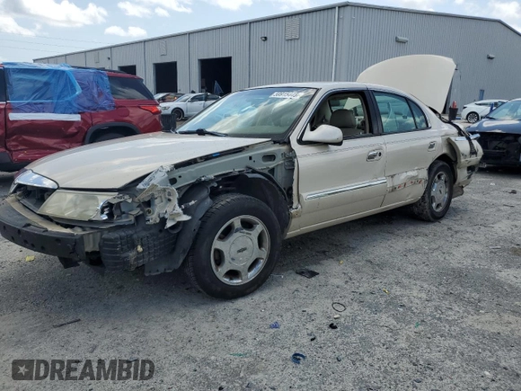 2001 Lincoln Continental z VIN 1LNHM97V91Y622267, wystawiony jako Copart lot #59915445 z przebiegiem 77 070 mil mil oraz Szkoda całkowita • Salvage title. Historia ofert i sprzedaży dostępna na DreamBid. Obrazek 1.
