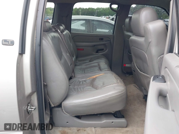 2005 Chevrolet Suburban LT z VIN 3GNEC16ZX5G197892, wystawiony jako IAAI lot #42045100 z przebiegiem 262 665 mil mil oraz . Historia ofert i sprzedaży dostępna na DreamBid. Obrazek 8.